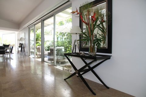 How Concrete Flooring Can Help You Achieve The Minimalist Look - Flower Display Adding Colour