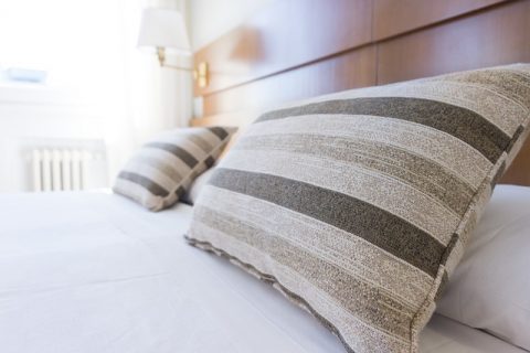 How Concrete Flooring Can Help You Achieve The Minimalist Look - Neutral Bedding.
