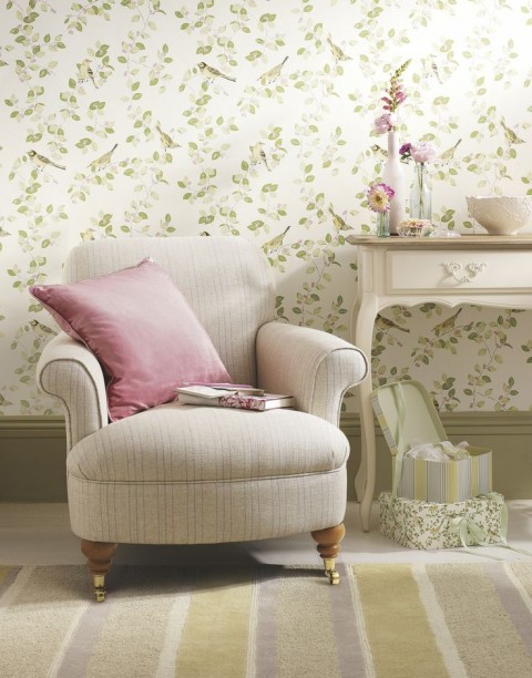 Chair and table with floral wallpaper background