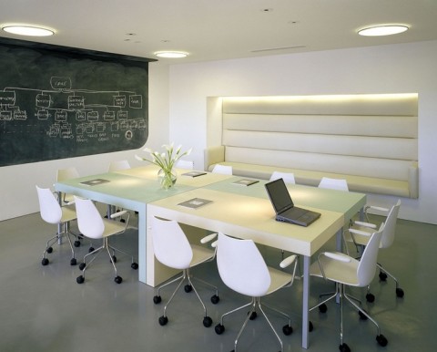 Modern white modular boardroom table