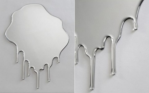 Unusual dripping mirror centerpiece