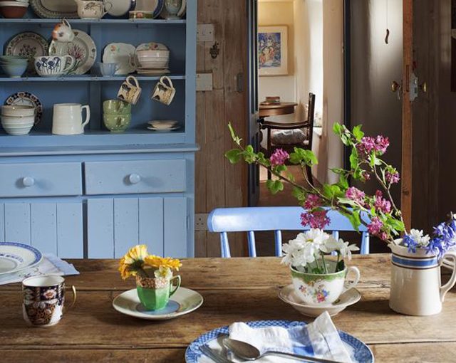 Cottage Country Kitchen With Blue Dresser & Wooden Table