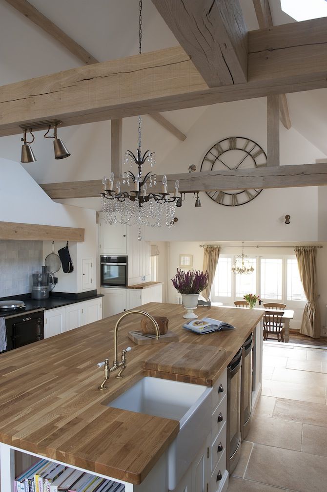 10 Ways To Light Your Kitchen To Achieve The Right Look & Ambience - Country Kitchen Diner With Chandelier Lighting