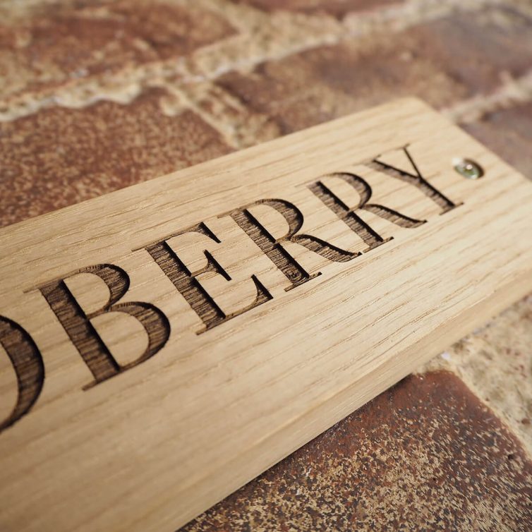 Wooden house sign