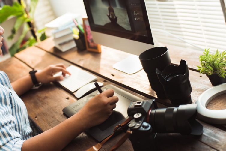 Photographer working at desk