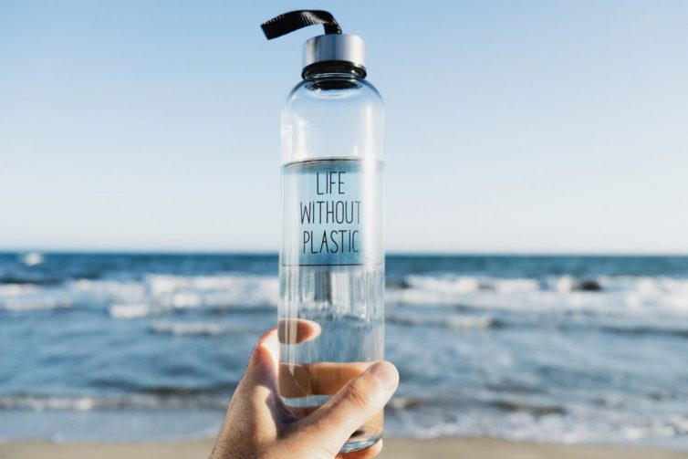 Reusable glass water bottle