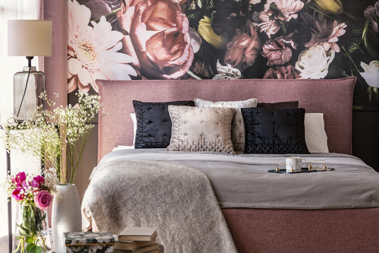 Bedroom with large flower wallpaper