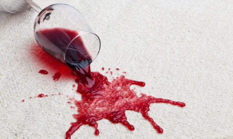 Red wine spilt on carpet