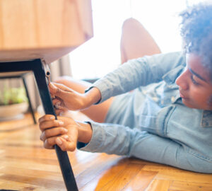 Women mending chair