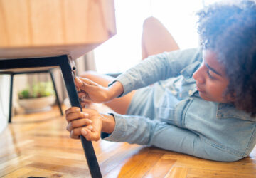 Women mending chair