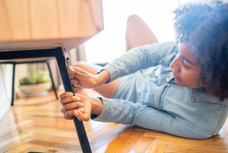 Women mending chair