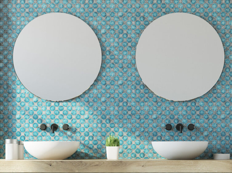 Bathroom with double sink and mirror with blue circular tiles