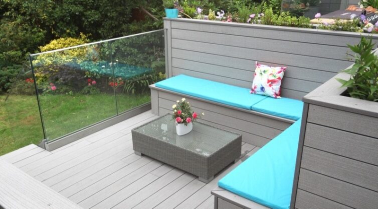 Grey composite decking and seating with blue cushioning