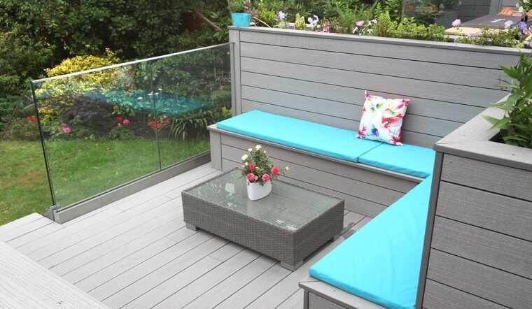 Grey composite decking and seating with blue cushioning