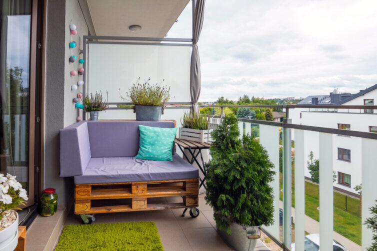 Balcony, plants, lighting and pallet chair