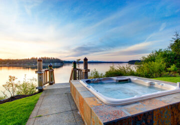 Hot tub in garden with sea views