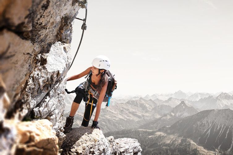 woman mountain climbing