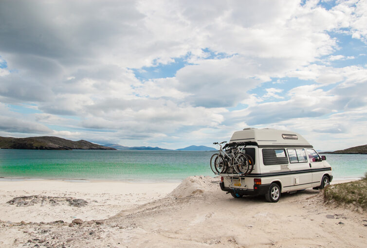 Camper van parked on beach in the Isle of Lewis, Outer Hebrides