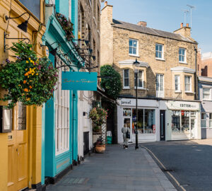 Picturesque street with small business and stores at Notting Hill in London, UK