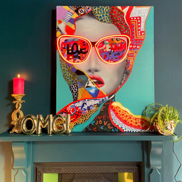 Gianna LED Neon Canvas Art £265. Ornate Leaping Fish Candle Holder £32.95. Gold OMG Balloon Ornament & Wall Décor £38.95.