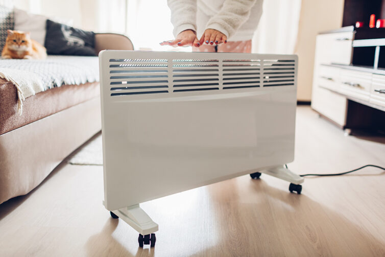 Electric radiator on wheels in living room