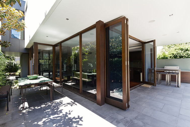 Bi folding doors opening to rear courtyard of contemporary open plan home