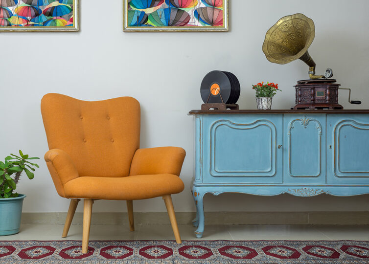 Orange retro chair. Vintage Gramophone. Upcycled, repainted blue sideboards.