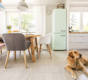 Scandi Kitchen with wooden dining table and mix of retro inspired chairs