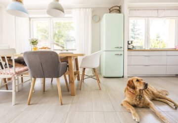 Scandi Kitchen with wooden dining table and mix of retro inspired chairs