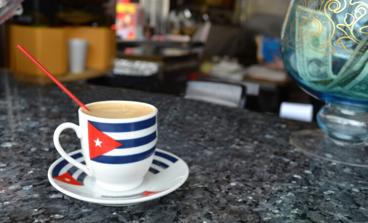 Expresso coffee in cup with Cuban flag