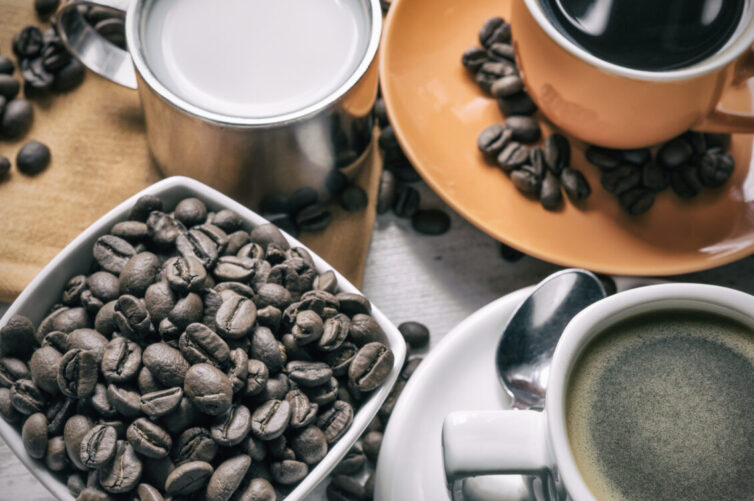 Coffee beans and coffee in cups