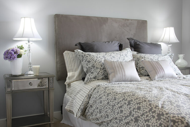 Stylish grey and glass bedroom