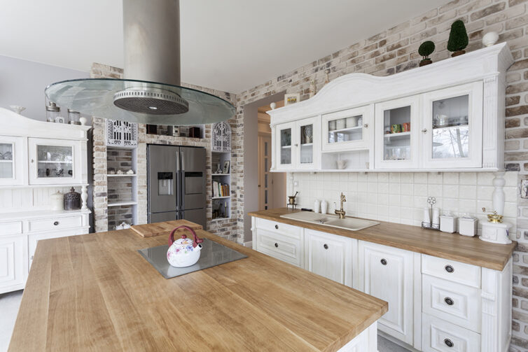 White kitchen with wooden worksurfaces