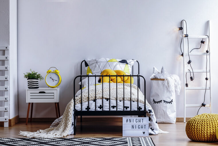 Black and yellow bedroom. Designed around black metal bed