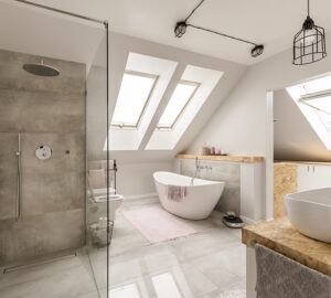 Modern bathroom with freestanding white bath and large walk in shower