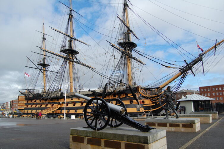 Exterior view of the HMS Victory in harbor in Portsmouth