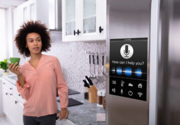 Women standing in smart kitchen