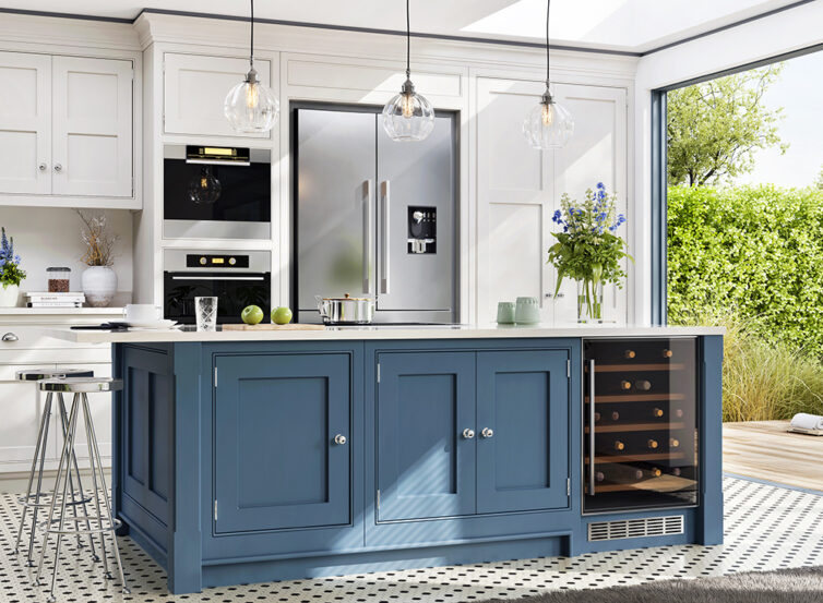 Blue and white kitchen cabinets in with built in cooker, American style fridge freezer and wine cooler cabinet