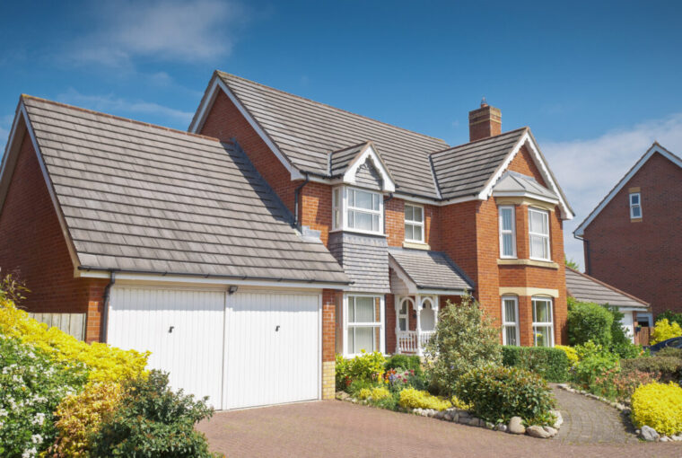 Large new build detached house with double white painted garages