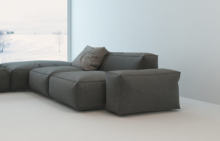 Grey modular sofa in contempory living room with large glass window