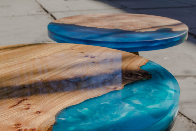 Two wooden and blue epoxy resin coffee tables