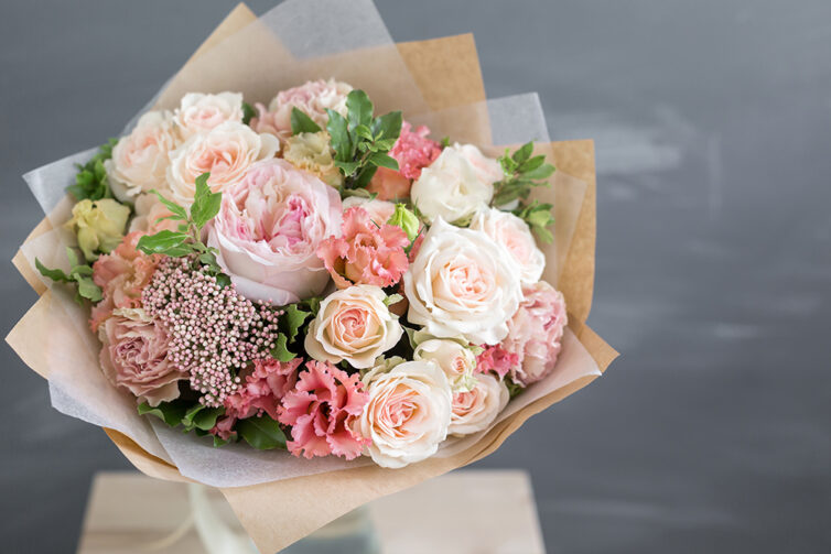 Bouquet of roses in kraft paper