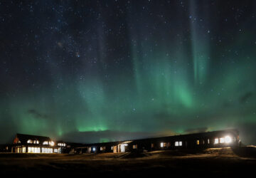 HELLA, ICELAND - in december at luxury hotel in Iceland beneath Northern Lights
