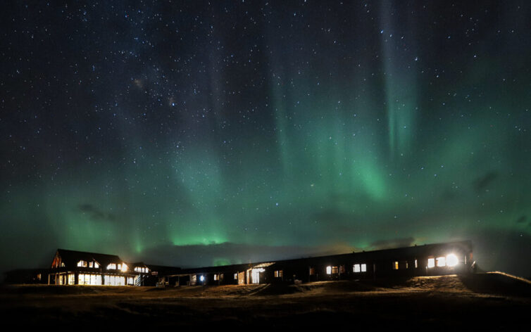 HELLA, ICELAND - in december at luxury hotel in Iceland beneath Northern Lights
