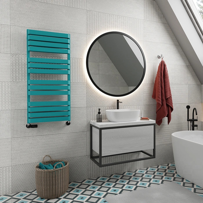 Aqua coloured wall radiator in bathroom